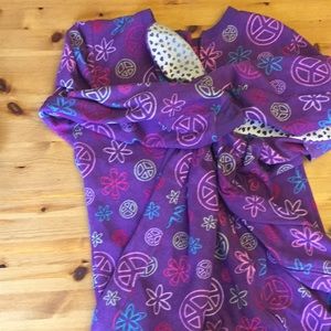 kids peace sign and flower designed footie pajamas